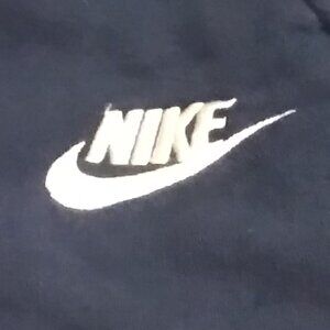 Blue Nike sweatpants. Boys large